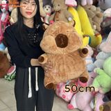  Gấu bông capybara má phính đeo túi con rùa 