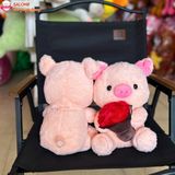  Gấu bông heo ôm hoa dễ thương 
