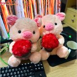  Gấu bông heo ôm hoa dễ thương 