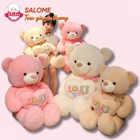 Gấu bông teddy ôm tim
