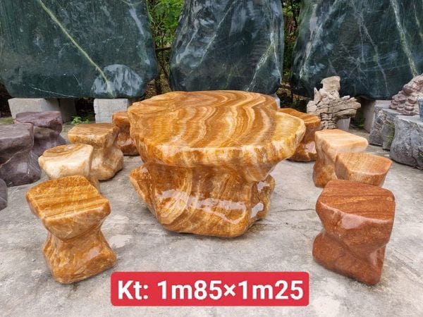 Bàn ghế đá tự nhiên Bộ bàn ghế đá can xít vân gỗ – Đá can xít vân gỗ nguyên khối
