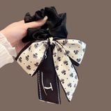  Cột tóc CO01 – Cột tóc ruy băng bản to họa tiết sang trọng 