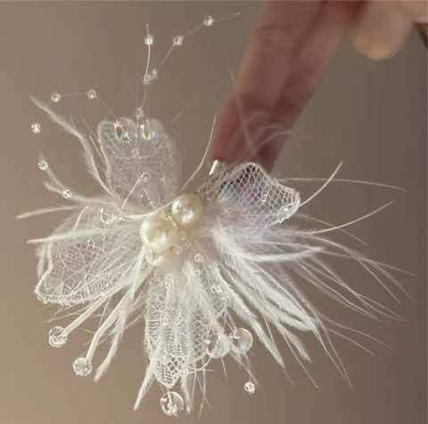  Kẹp tóc KTT0057 Kẹp hoa bướm lông vũ 