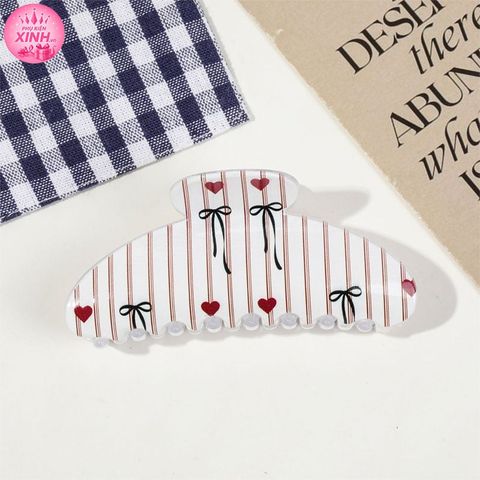  KẸP TÓC TK0319 – HỌA TIẾT NƠ NGỌT NGÀO MÙA GIÁNG SINH ✨ 