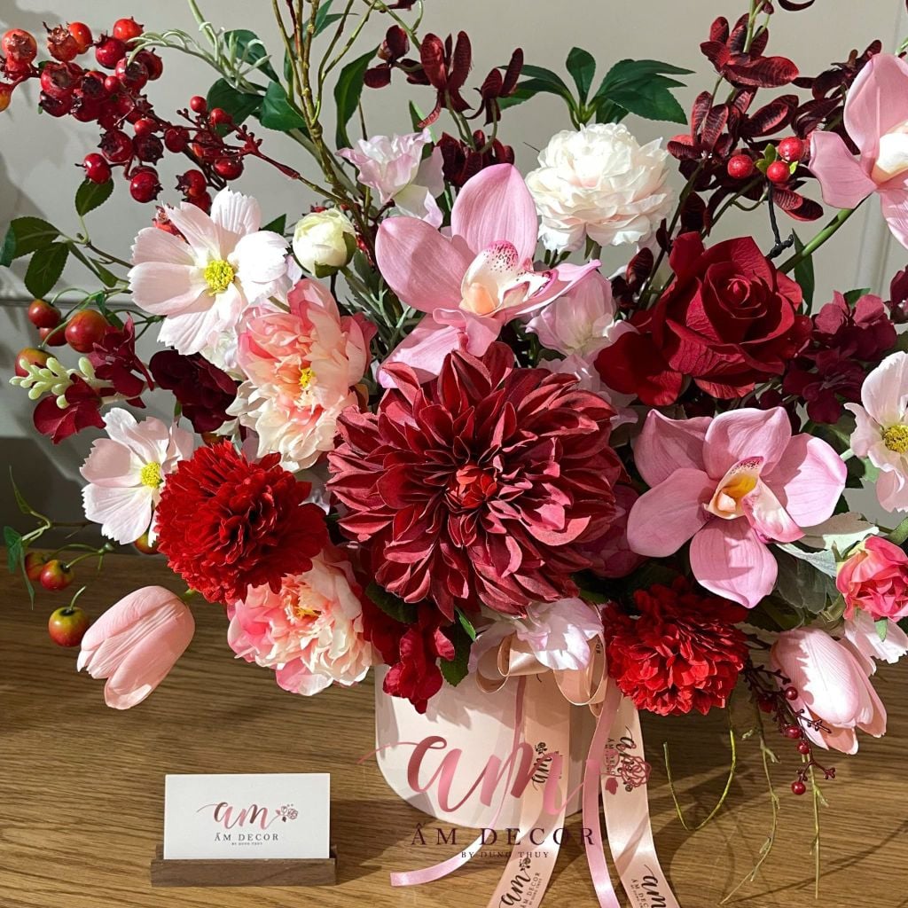 A PLUM RED FLORA BOX