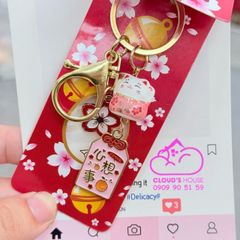 Móc Khóa Mèo Hoa Anh Đào Tết 2026