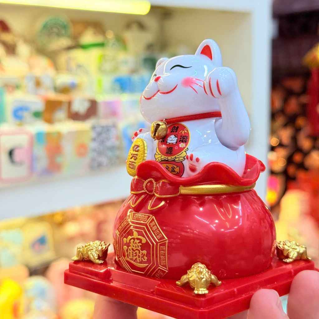 MÈO THẦN TÀI Có Chuông ngồi trên Túi Tiền Vẫy Tay