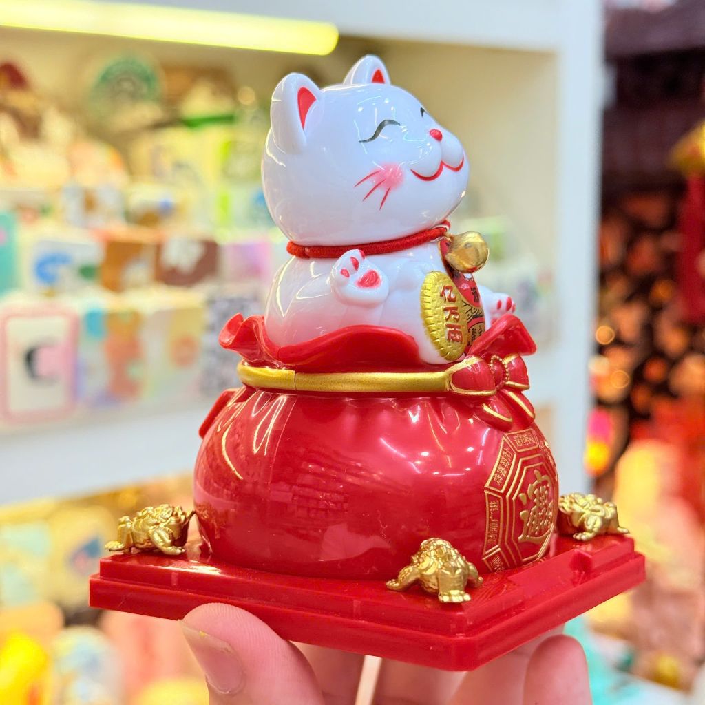 MÈO THẦN TÀI Có Chuông ngồi trên Túi Tiền Vẫy Tay