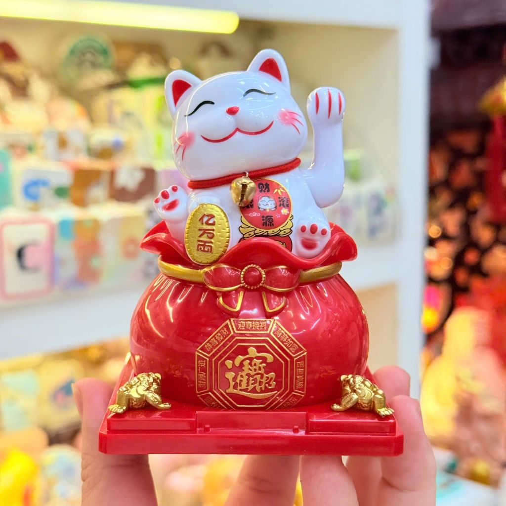 MÈO THẦN TÀI Có Chuông ngồi trên Túi Tiền Vẫy Tay