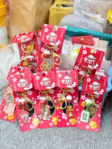 Móc Khóa Mèo Hoa Anh Đào Tết 2026