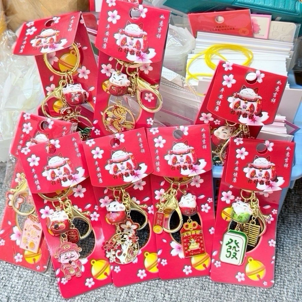 Móc Khóa Mèo Hoa Anh Đào Tết 2026