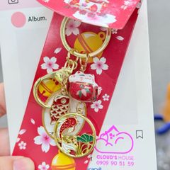 Móc Khóa Mèo Hoa Anh Đào Tết 2026