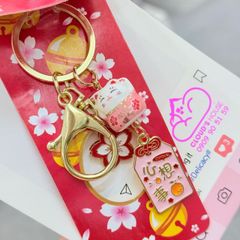 Móc Khóa Mèo Hoa Anh Đào Tết 2026