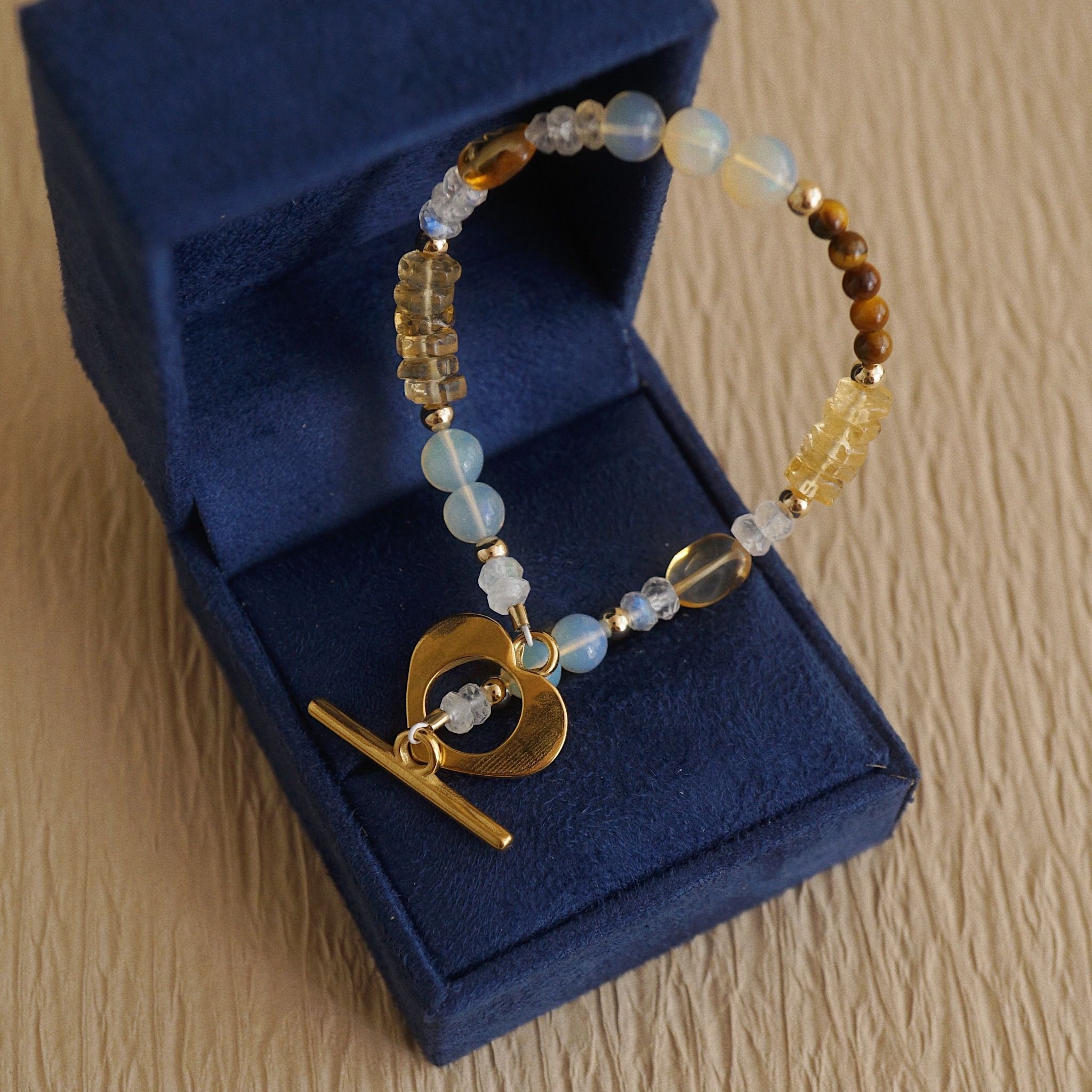 SUNLIT EMBER HEART CLASP BRACELET 