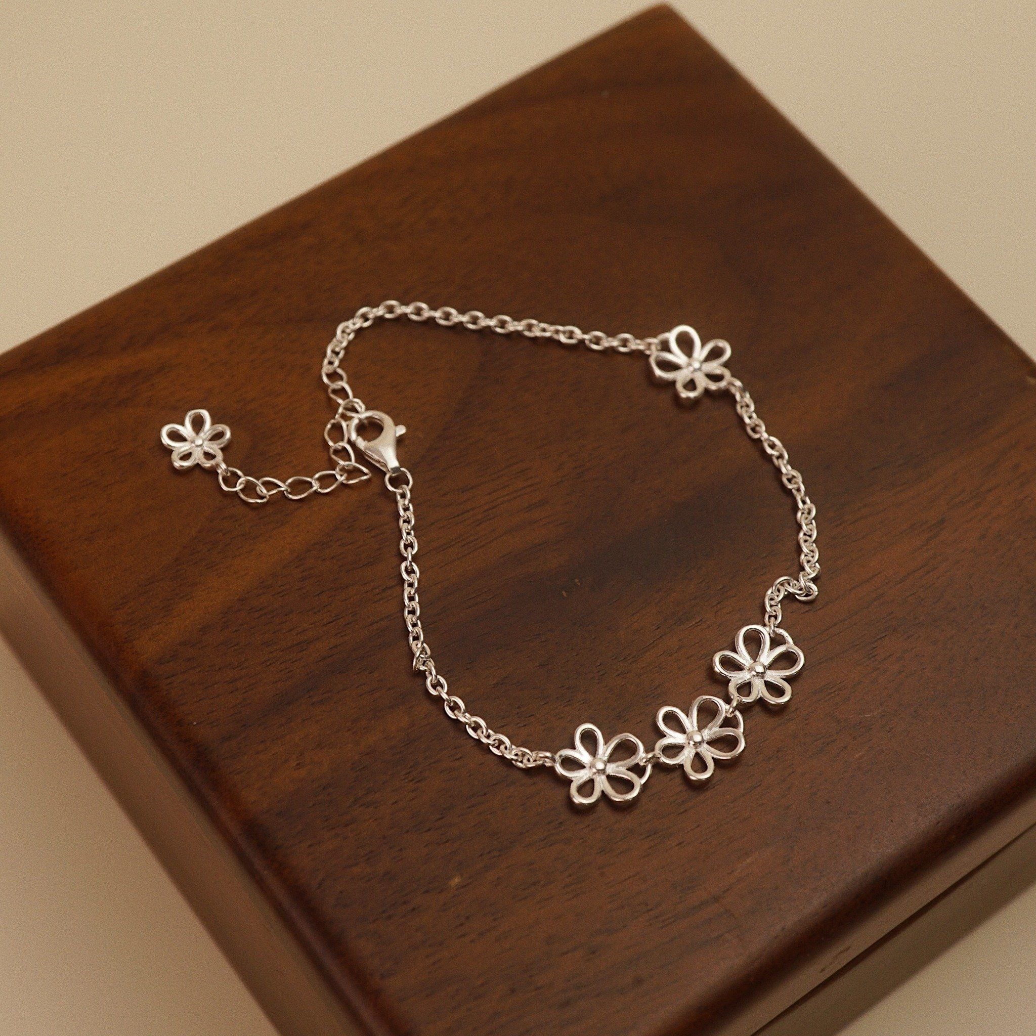  TRIPLE FLOWER BRACELET (S) 