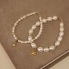  CLOVER LEAF - BOLD RICE SHAPE PEARL MIX ORBIT BRACELET 