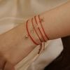  WISHBONE - RED LUCKY STRING BRACELET 