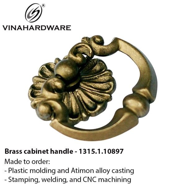 Tay nắm hoa văn đồng thau