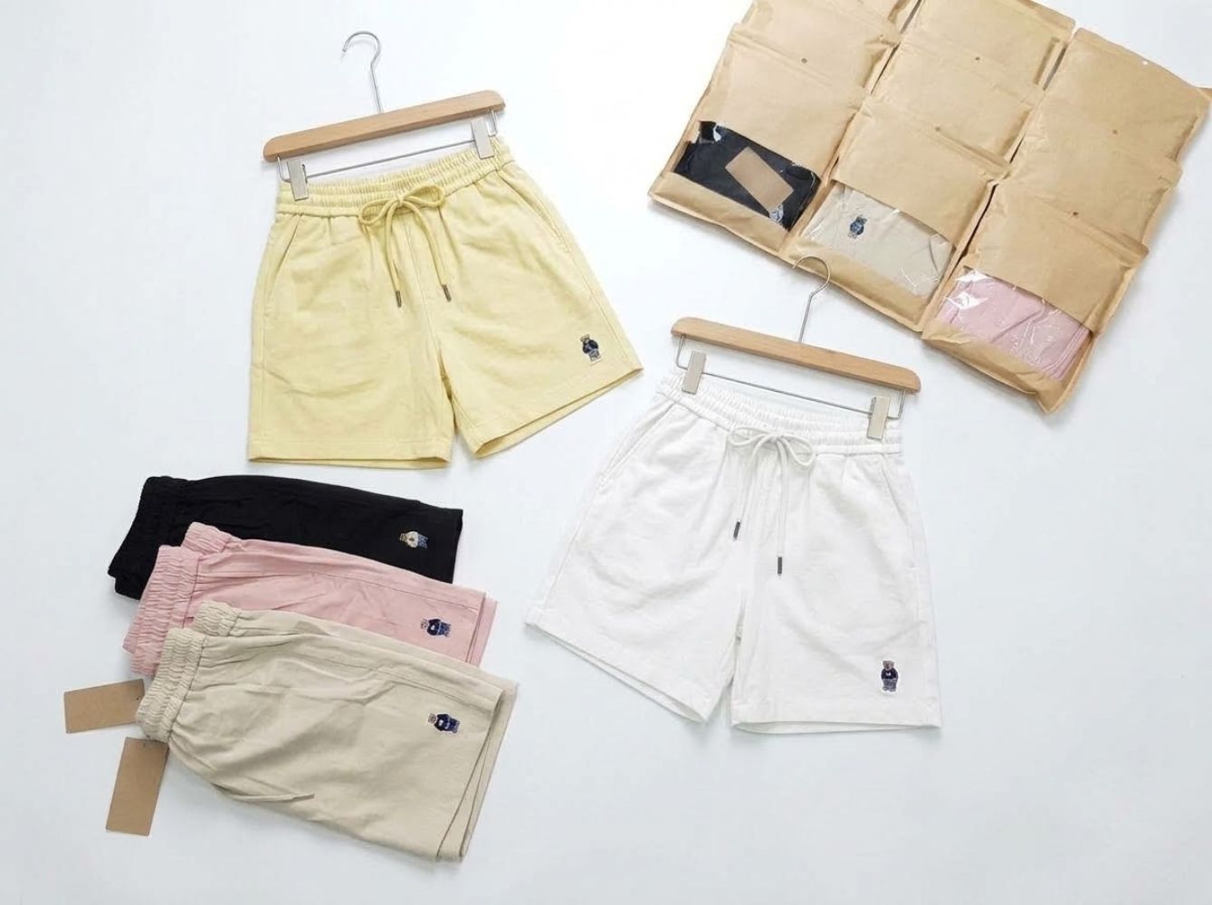  Quần short nữ thêu hình gấu cạp chun năng động, dễ thương 