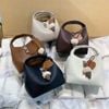 Túi xách bucket charm que kem nữ