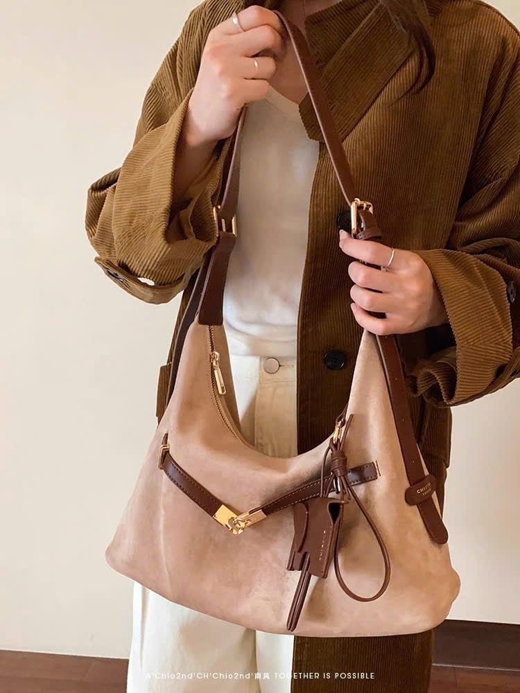  Túi cs charm voi nữ 