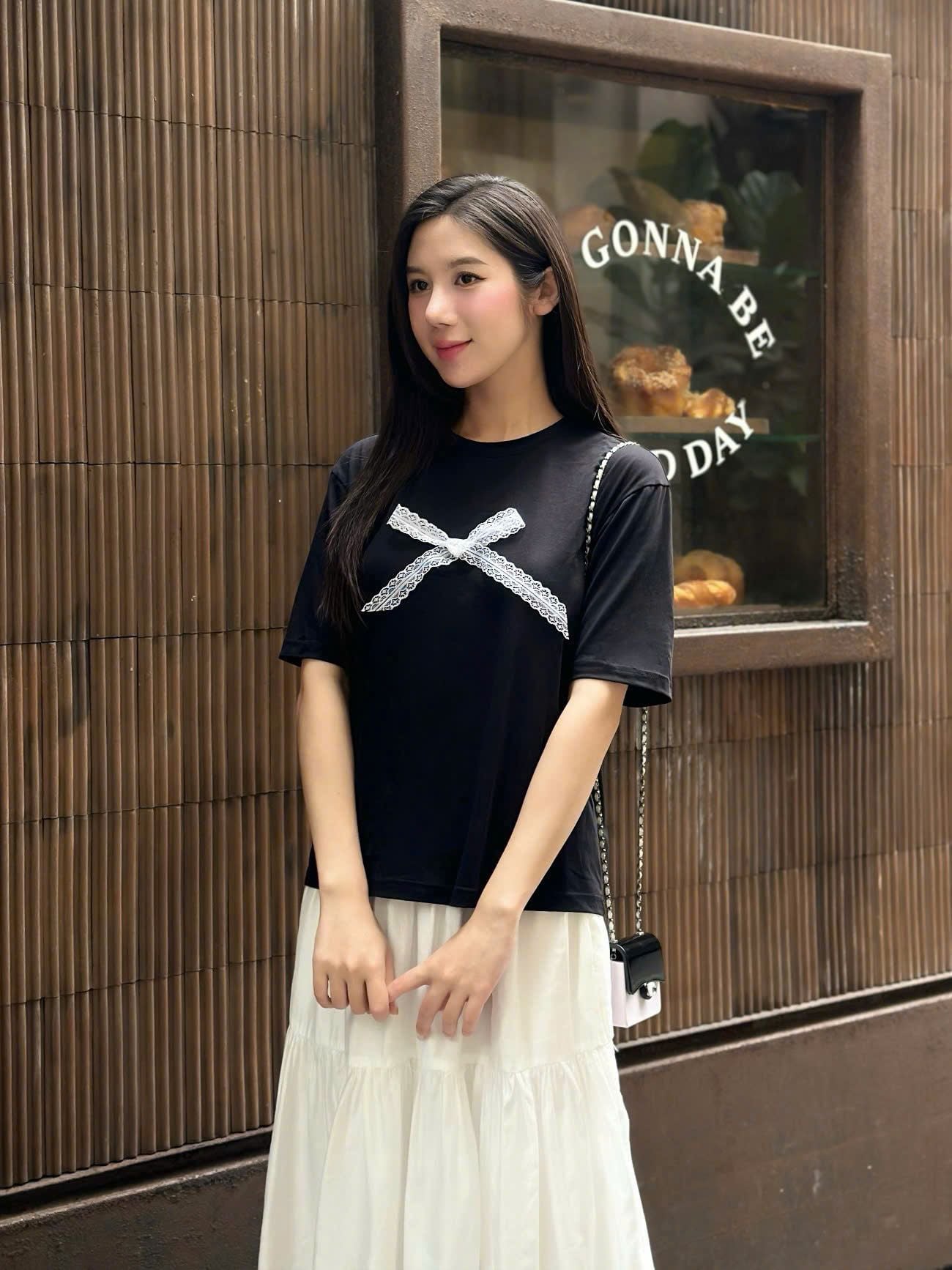  Áo thun hoạ tiết nơ đính nổi nữ 