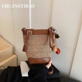  Túi bucket chio cói đan phối da nâu đeo chéo nữ 