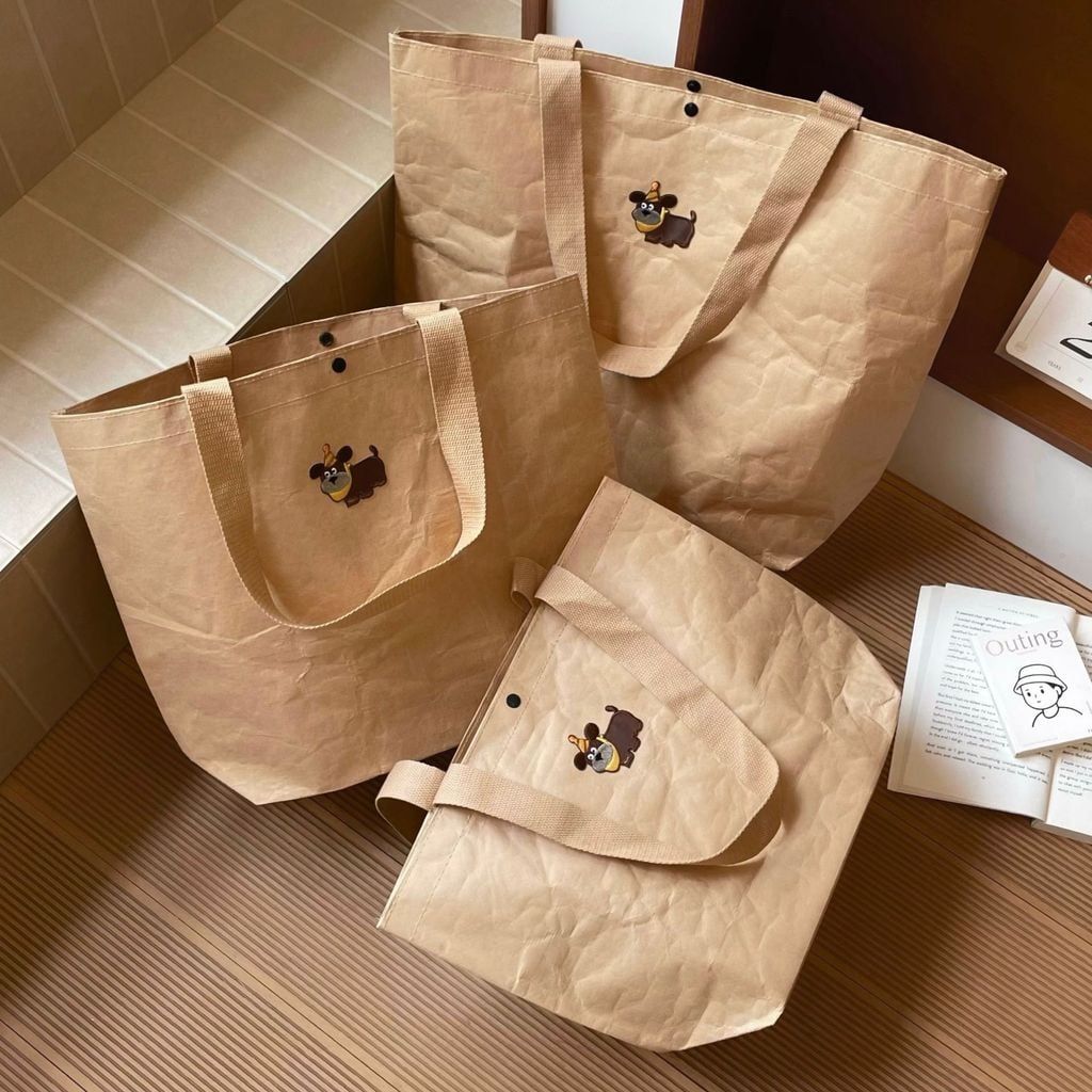  小狗牛皮纸手提包包新款卡通简约大容量托特包出差通勤百搭单肩包 