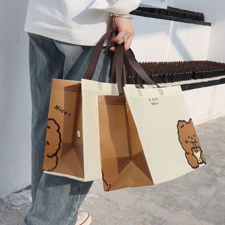  Bộ 10 túi vải không dệt hình chú gấu đáng yêu, tiện lợi cho quà tặng và shopping! 
