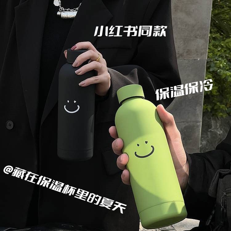  Bình Giữ Nhiệt Inox Màu Pastel Hình Mặt Cười - Cốc Nước Cầm Tay Dung Tích Lớn, Phong Cách Tối Giản, Nhẹ Gọn [GIAO HÀNG 2-10 NGÀY | SỈ TỪ 2 TRIỆU | CÓ THỂ IN LOGO] 