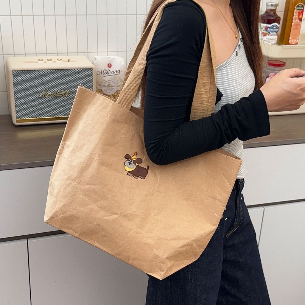  小狗牛皮纸手提包包新款卡通简约大容量托特包出差通勤百搭单肩包 