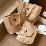  小狗牛皮纸手提包包新款卡通简约大容量托特包出差通勤百搭单肩包 