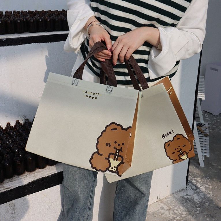  Bộ 10 túi vải không dệt hình chú gấu đáng yêu, tiện lợi cho quà tặng và shopping! 