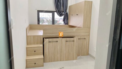 Hệ giường tủ bàn kết hợp lưu trữ thông minh cho căn hộ dịch vụ anh Hồng Văn