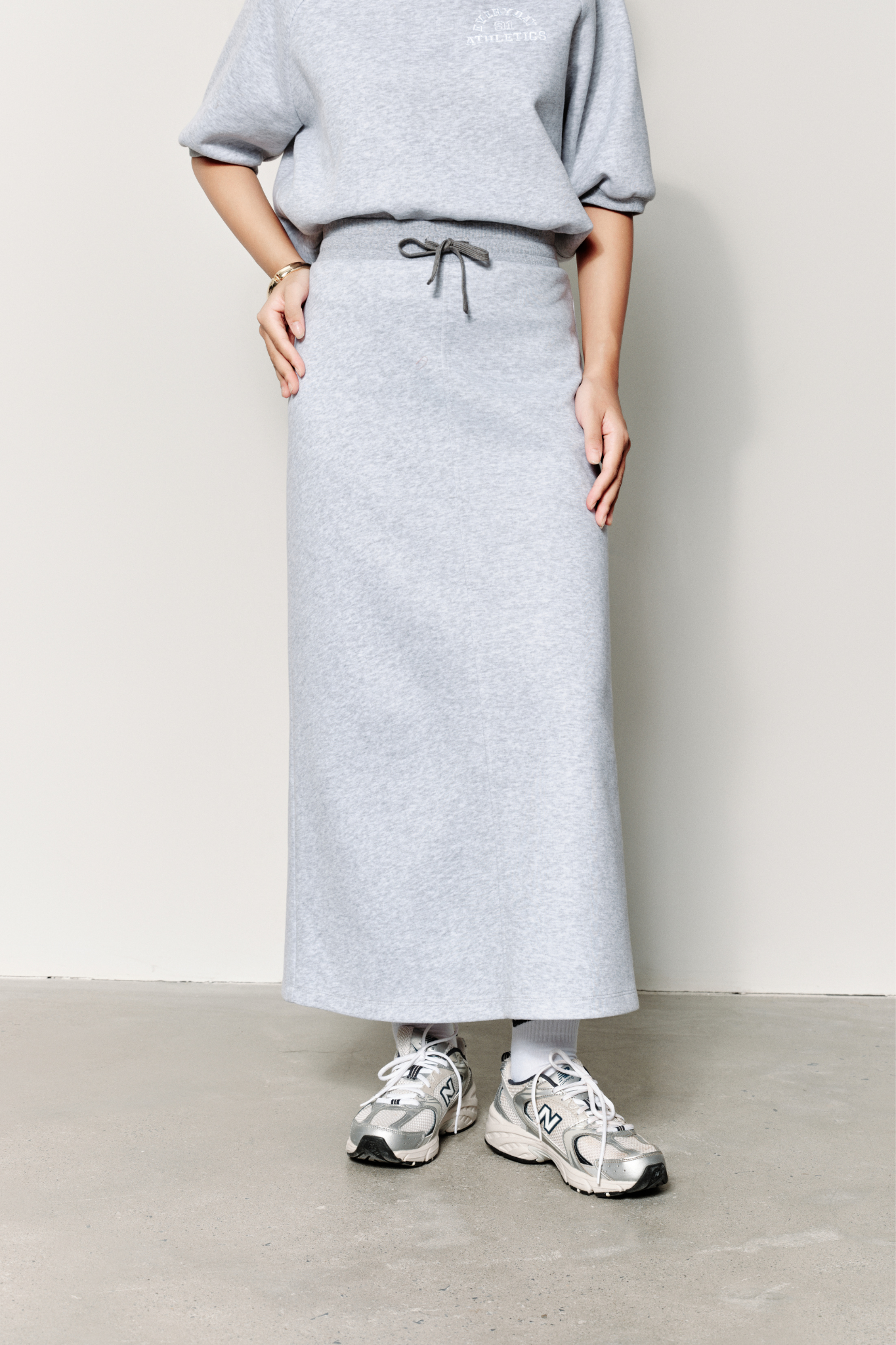  Chân Váy Nữ Vải Nỉ 2 Da Dáng Midi Xẻ Sau 