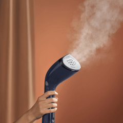 Bàn là hơi nước cầm tay Philips Series 7000 STH7020/28 màu xanh