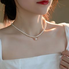 Vòng Cổ Ngọc Trai Gạo oval Tự Nhiên 6-8mm, Mặt Ngọc Tròn Lớn 11-12mm Cao Cấp Khoá Bạc s925 - Ngọc Trai Phú Quốc CG065LTR