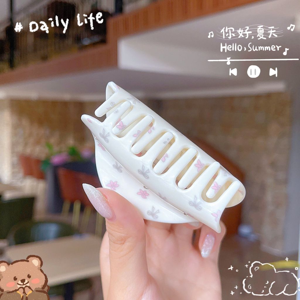 ** Kẹp càng cua hoa nơ nhí bầu màu be