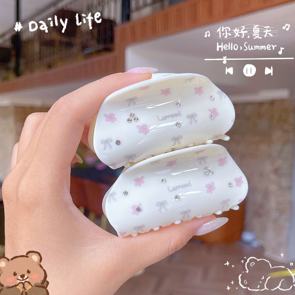 ** Kẹp càng cua hoa nơ nhí bầu màu be