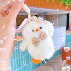 ** Móc khóa bông gà con trắng chân cam đội hoa đeo nơ dây thừng