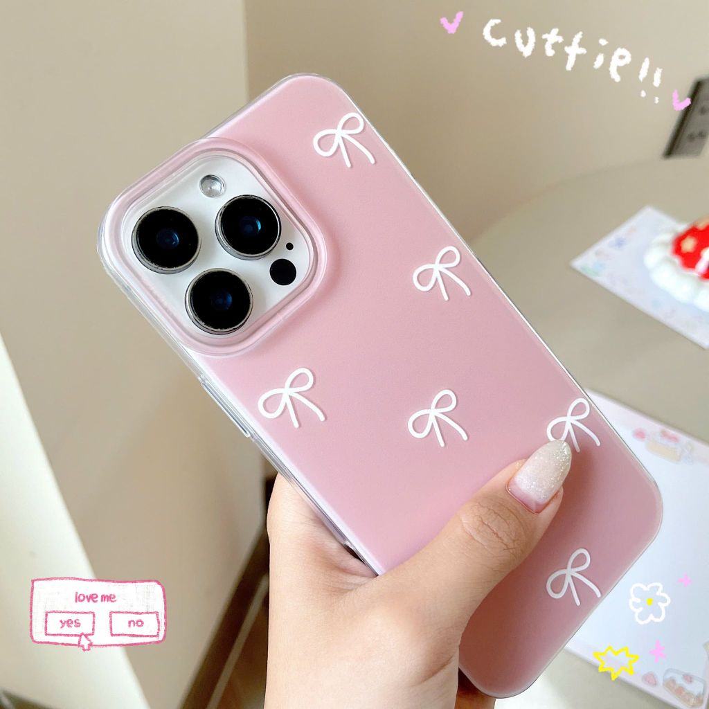 ** Ốp iPhone 16 Pro lưng cứng hồng cam trơn nơ trắng