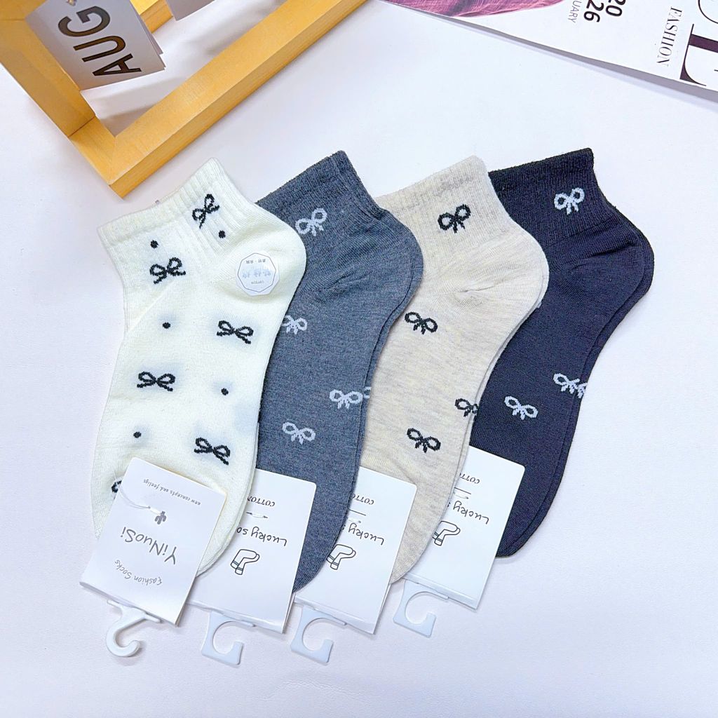 ** Tất/vớ size ngắn chất dày tag tone kem/XD in nơ