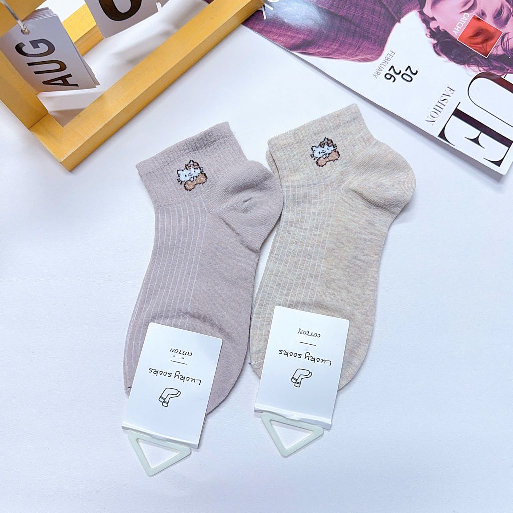 ** Tất/vớ size ngắn chất dày tag tone kem/XD in nơ