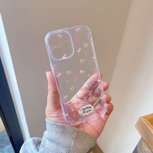 Ốp iPhone 16 6.1 dẻo trong đóa hoa nhí và nơ hồng