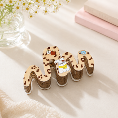 ** Kẹp càng cua da beo Kitty nâu/be hình sóng