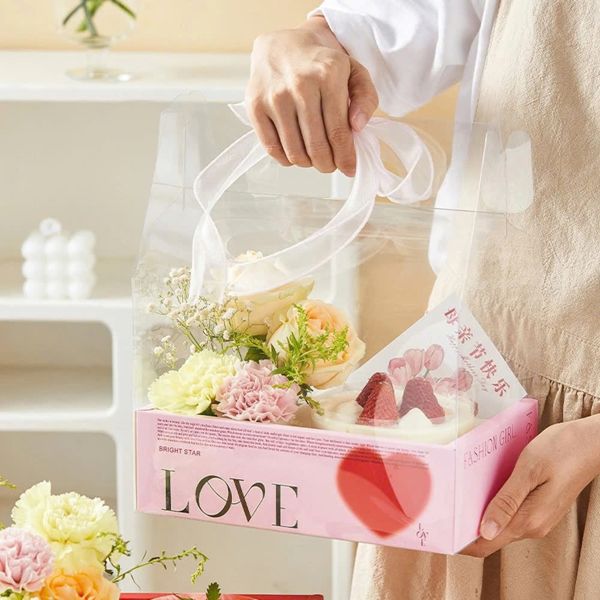 ** Hộp mica trong 2 ngăn có quai xách đế hồng/trắng
