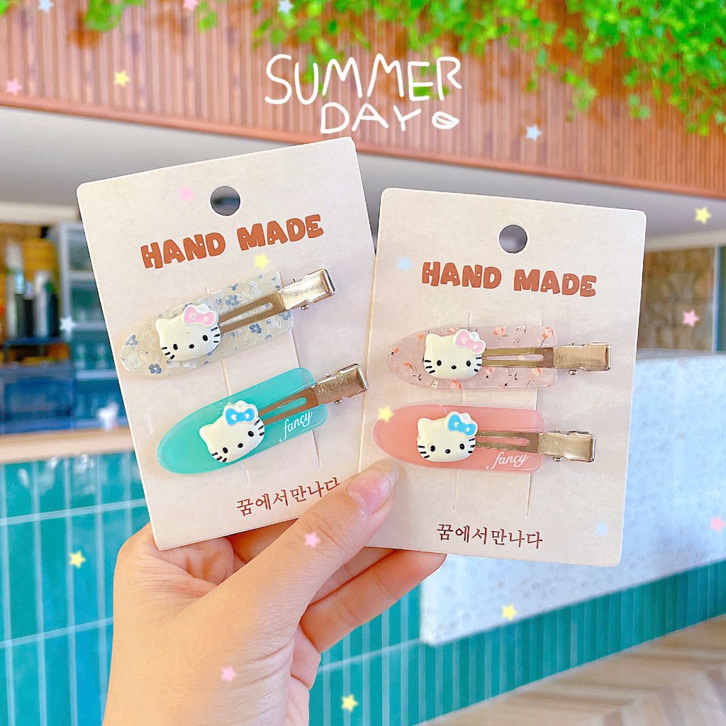 ** Set 2 kẹp xẻng đính charm kitty