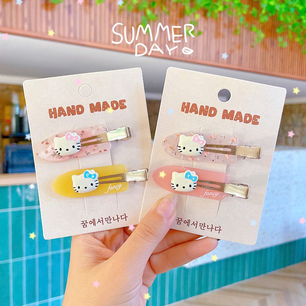 ** Set 2 kẹp xẻng đính charm kitty
