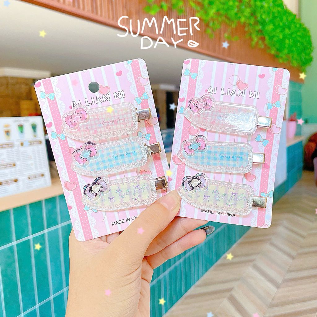 ** Set 3 kẹp hoa nhí caro mix nơ