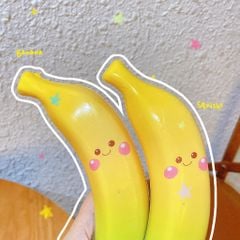** Squishy trái chuối mặt cười
